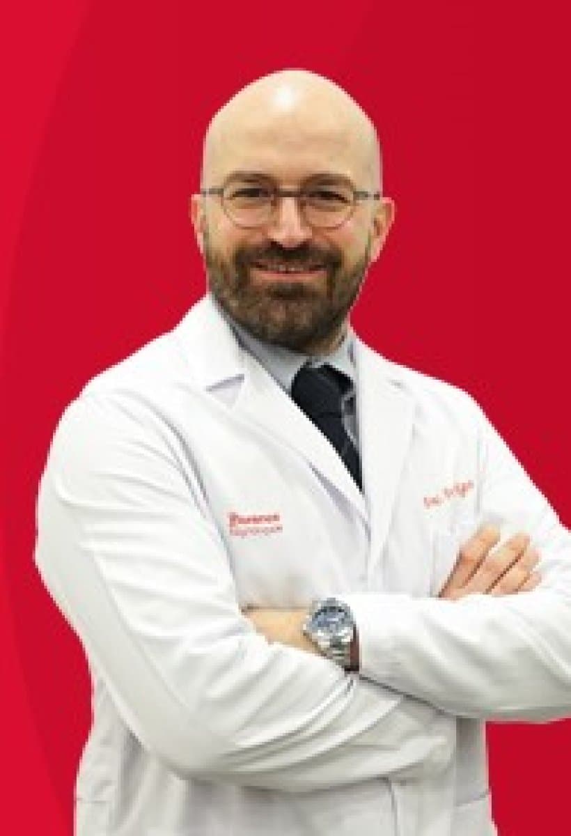 Dr. Yigit Changa